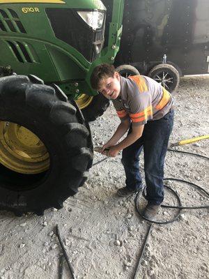 Rooster working on tires.