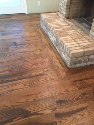 Solid oak floor with a custom European oil finish.