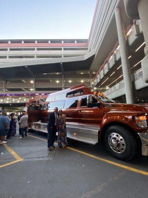 Hubby and I with the rest of them family being loaded into The Beast!