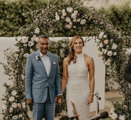 VJ personally came to install the flowers on my eucalyptus wedding arch.