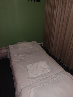 Massage rooms, separated by curtains