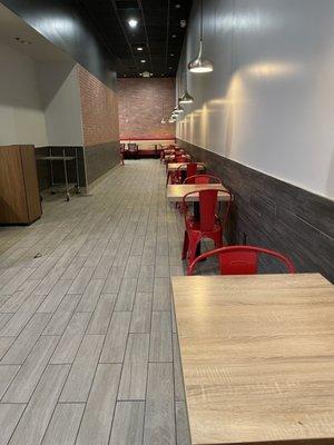 Looks like a great place to get some work done. Tons of tables with outlets. Wifi?