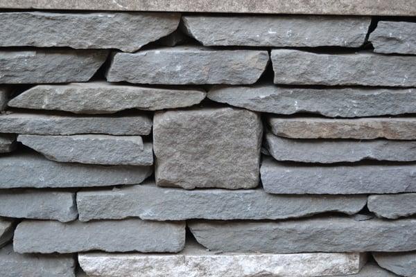 Dry-laid stone walls and stone planting beds.