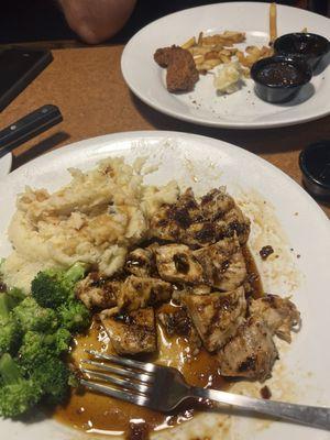 Whiskey glaze chicken breast, mashed potatoes and broccoli.