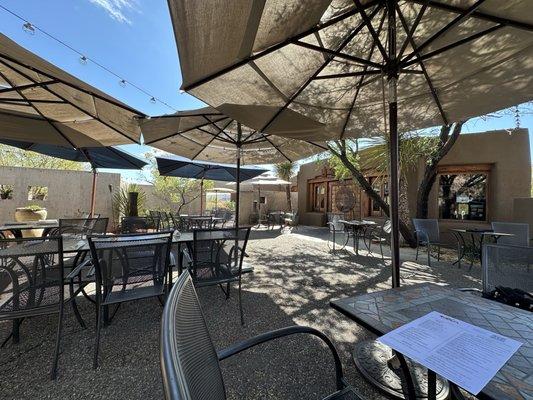 Shaded outdoor seating, the patio vibe is real.