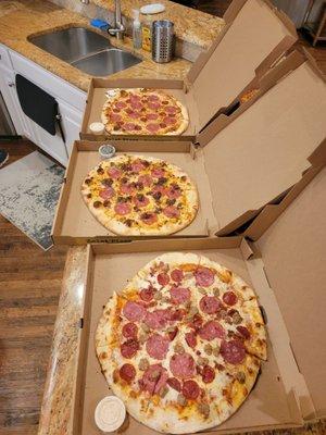 3 large meat pizzas. Middle pie is a spicy with fig. Delivery was pretty fast.