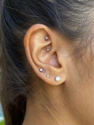 Rook and third lobe ear piercings