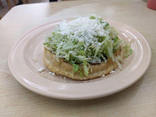 Sope sencillo. No meat, just creamy beans, fresh crunchy lettuce, savory Cotija cheese. Crema on the side like always.