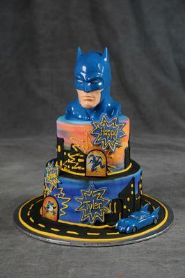 Even Super hero's like cool cakes and parties.