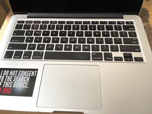 2015 MacBook trackpad replaced by J&B Computer (Apr 2021).