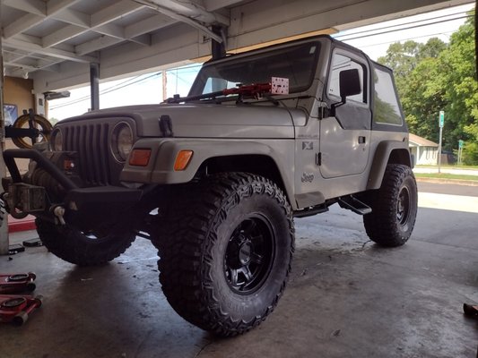 Beautiful update jeep with new tires in wheels