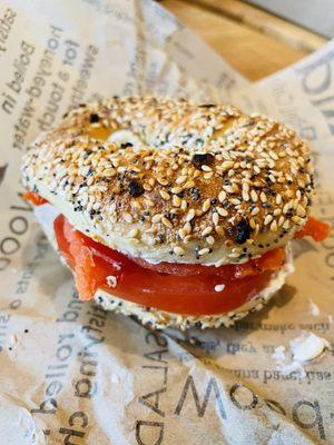 Everything bagel with lox and tomato.