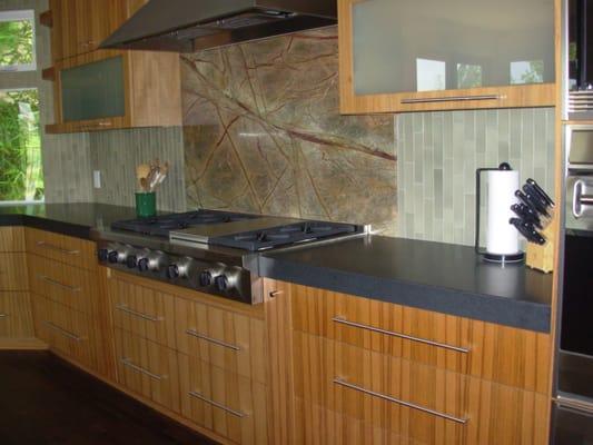 Kitchen with High Slab Splash behind Stove