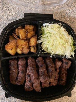 Cevapi plate with potatoes and cabbage