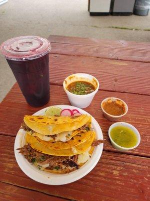 Quesobirria with consummè.  Hibiscus drink called Jamaica.