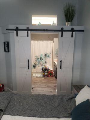 Barn doors can change the look of your bedrooms and give you privacy for your bathroom