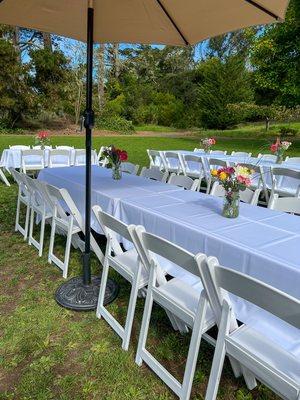 SF, CA (Golden Gate Park) Pictured: White Resin Folding chairs, 6ft rectangular tables, white mid length table cloths & 9ft umbrella + base!