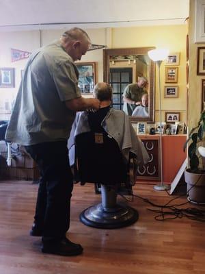 Ken cutting my dads hair.