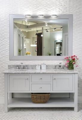 Gray Plain & Fancy vanity in our showroom