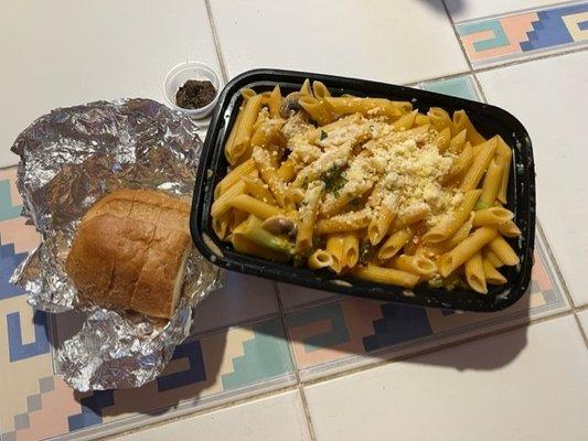 Penne Alla Vodka with bread & olive spread.