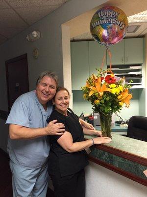 Dr. Payton celebrating with Maria her 25 years of loyalty!