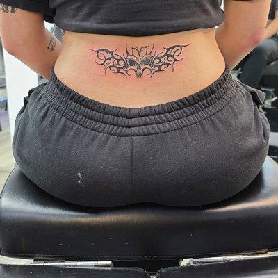 Lower back tattoo