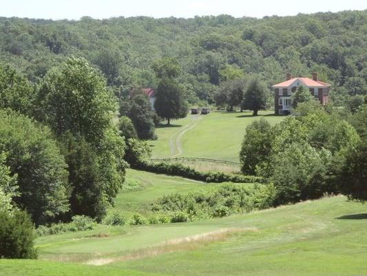 Breath taking view from back patio of clubhouse overlooking hole #2! House was used as a hospital during Civil War!