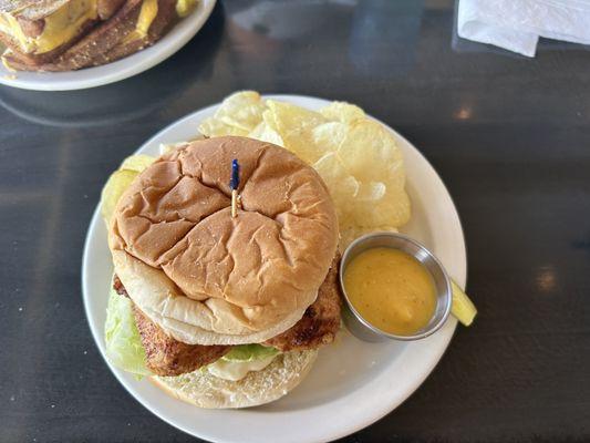 Fried chicken sandwich, honey mustard and chips