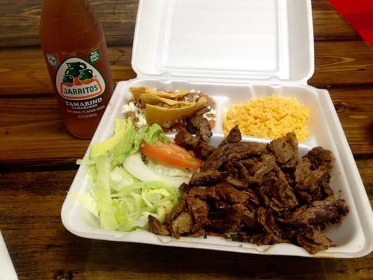 Plato fajita is legit. About a pound of perfectly marinated, tender skirt steak, rice, beans and salad.