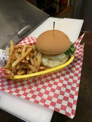 Avocado burger with Swiss cheese and home made fries.