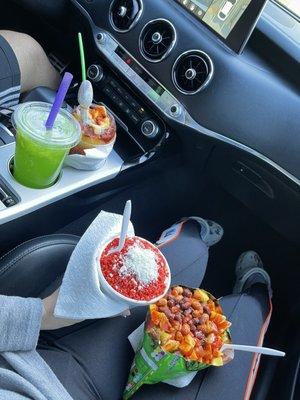 Hot Cheeto esquite, tostilocos, mangoniada, and agua fresca.