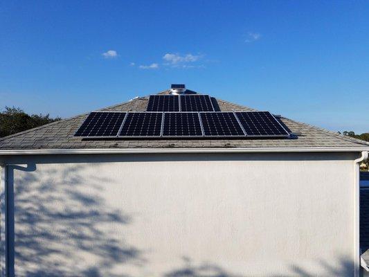 Photovoltaic w/ Solar Attic Fan on nice 2-story home. Learn how to save money on your electric bill...