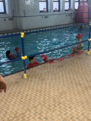 at British swim school. In 1 month they have learned to float, back stroke and regulate their breath in the water.