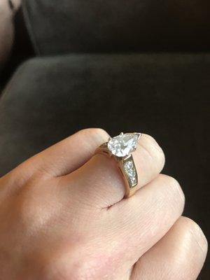 Pear shaped engagement ring - 18K gold band with accent diamonds. Tacoma Custom Jewelers