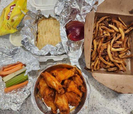 Buffalo wings, Belgian fries and grilled cheese