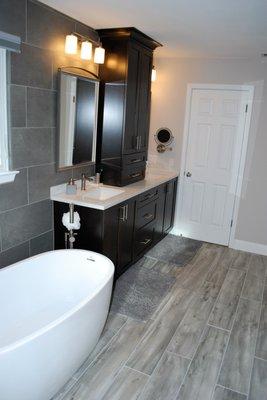 Hardwood tile and tile walls for a modern crisp look.