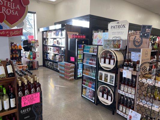 Tequila and wine bottles on shelves