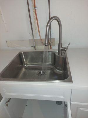 Installation of a new faucet.