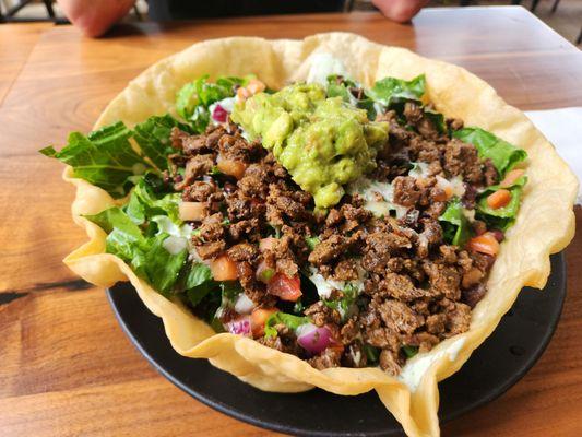 Tostada salad with asada.