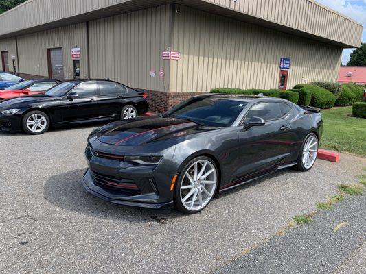 The crew repaired the front and added stripes to this gorgeous camaro !!!