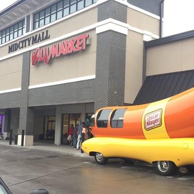 Get free wiener whistle and sticker from the Oscar Mayer wiener mobile.