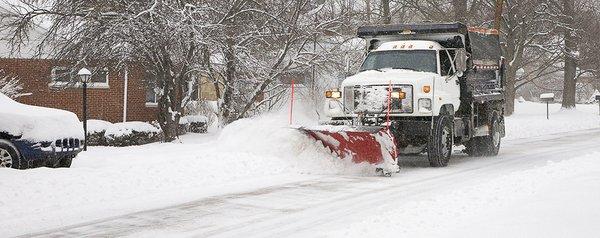 Commercial snow removal, de-icying, salting & snow plowing all offered by Bladecutter's