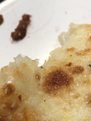 Hair baked into my cheese bread.