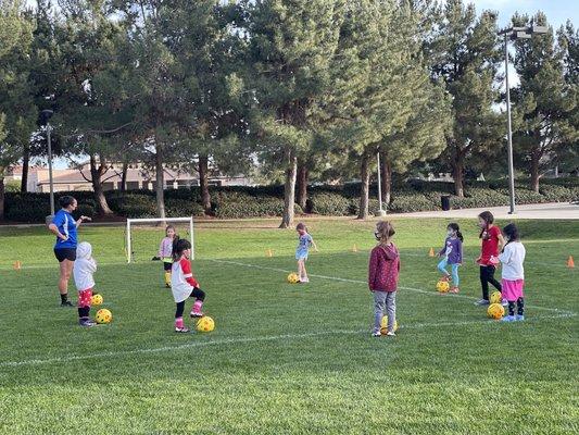 Coach christina setting up for a fun skill drill