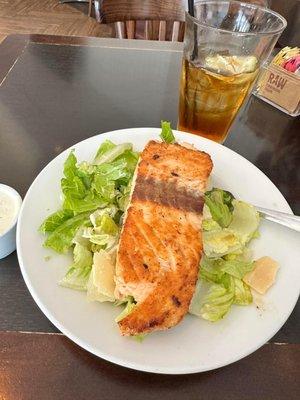 Small Caesar salad with grilled salmon on top. Salad was perfect with thick Parmesan shavings.