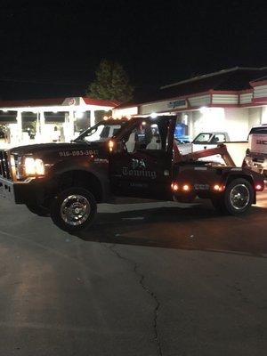 People being towed, 1 of 12, during a Christmas event (parade of lights). Vehicles not even in front of occupied businesses got towed.