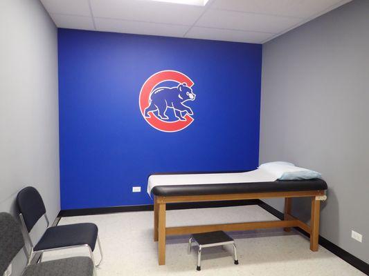 Our privatized examination room, featuring the Chicago Cubs logo, for the safety of the patient.