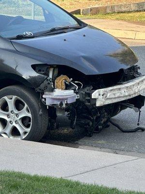 Car dumped on street after reported that it was ruining parking lot