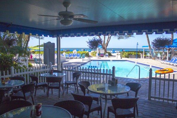 With plenty of seating around the pool, you can enjoy breakfast or lunch at Gulfside Grill, located at RumFish Beach Resort.