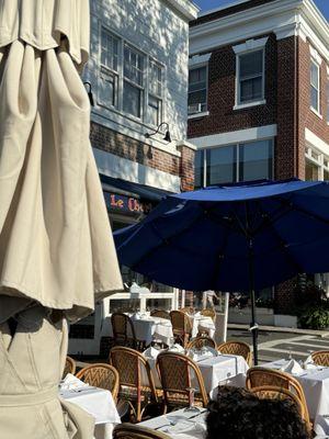 The entrance and outdoor seating for Le Charlot